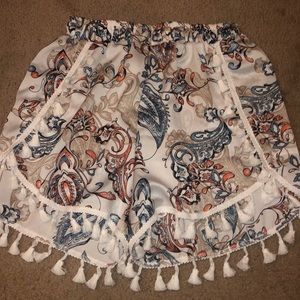 Medium tribal print fringe hem shorts